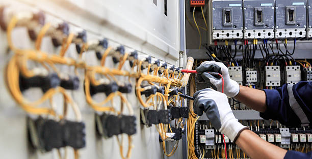 Professional Electrician technician working in Essex Village, CT